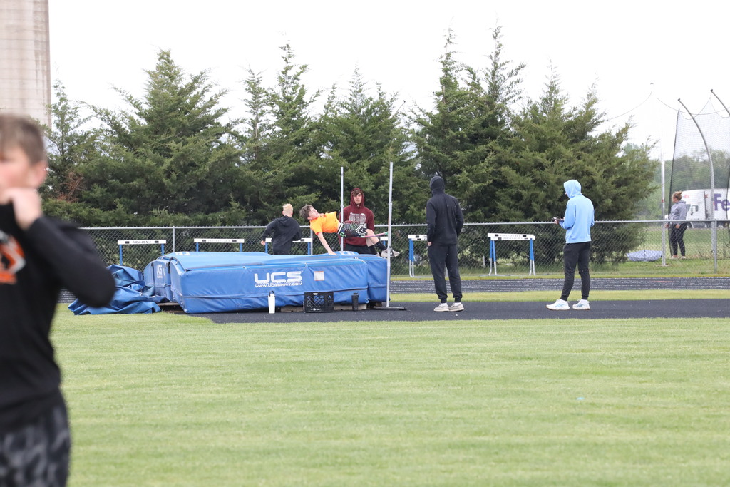 student doing the high jump.