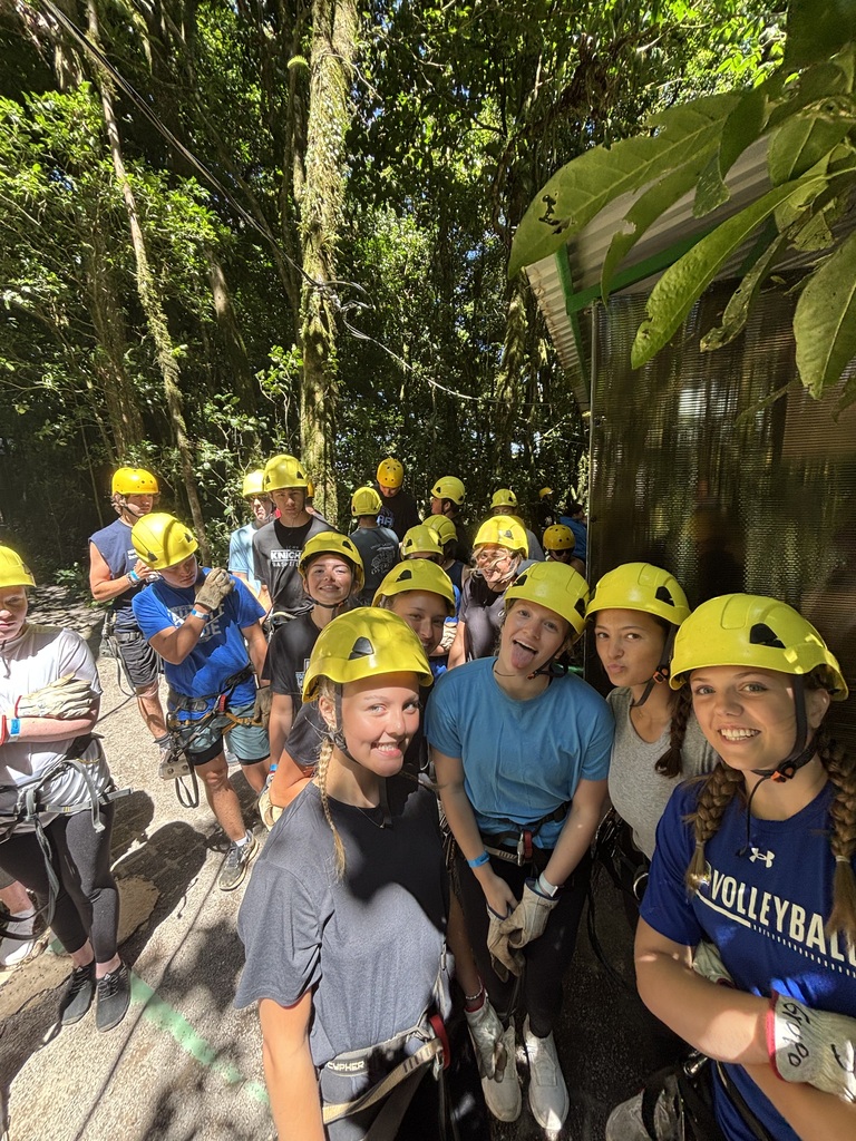 students wearing hard hats in the costa rica jungle.