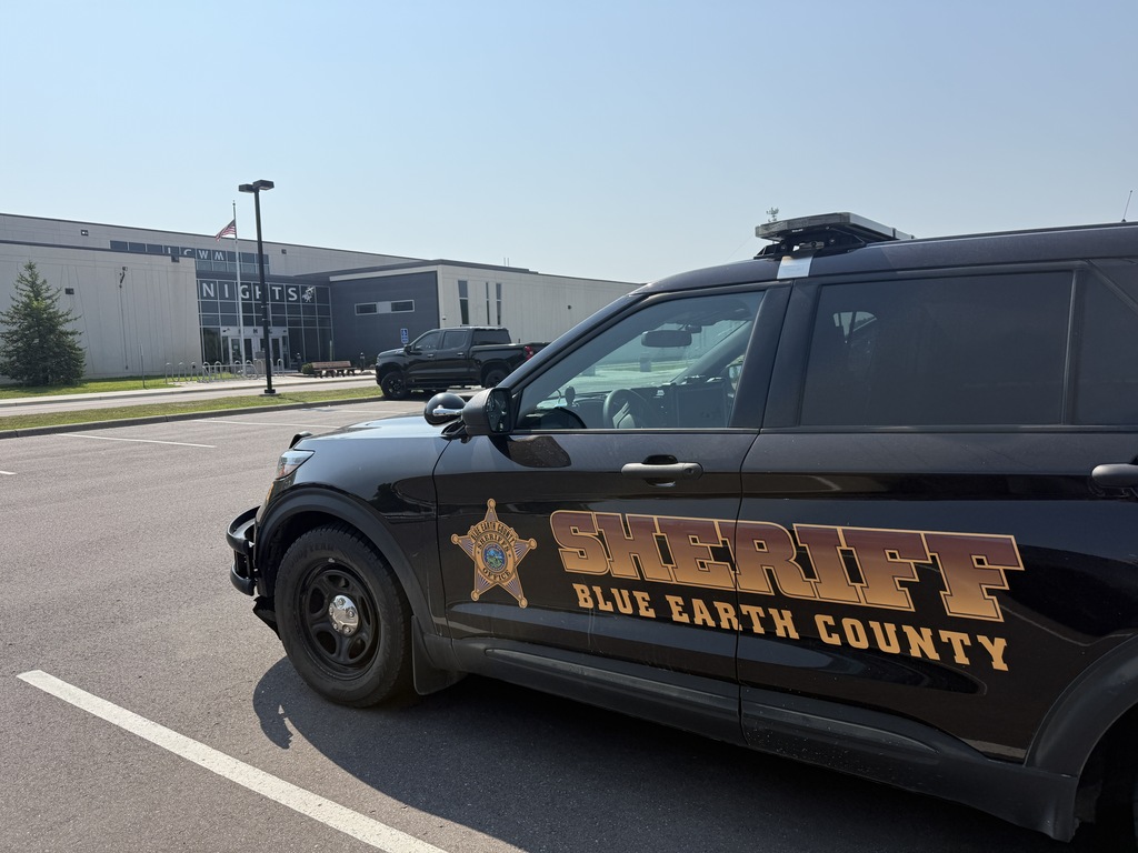Blue Earth County Sheriff's office car with the building in the background. 