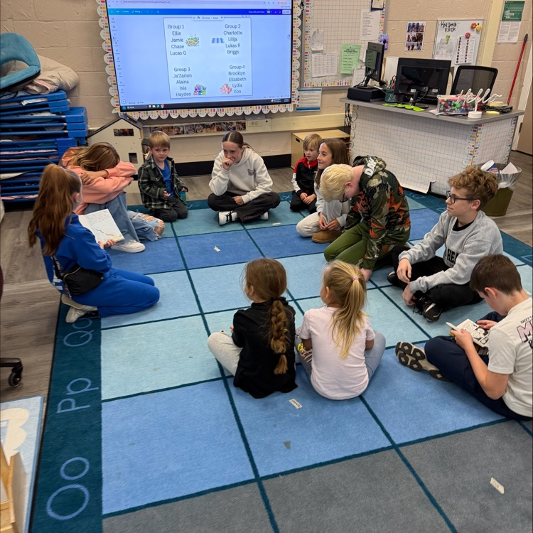 6th graders reading to preschoolers