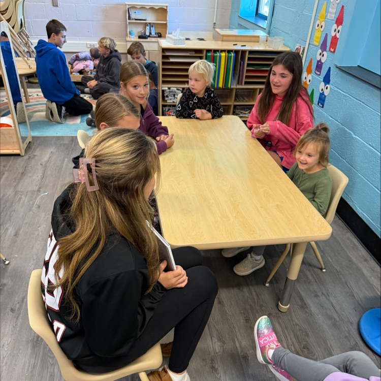 6th graders reading to preschoolers