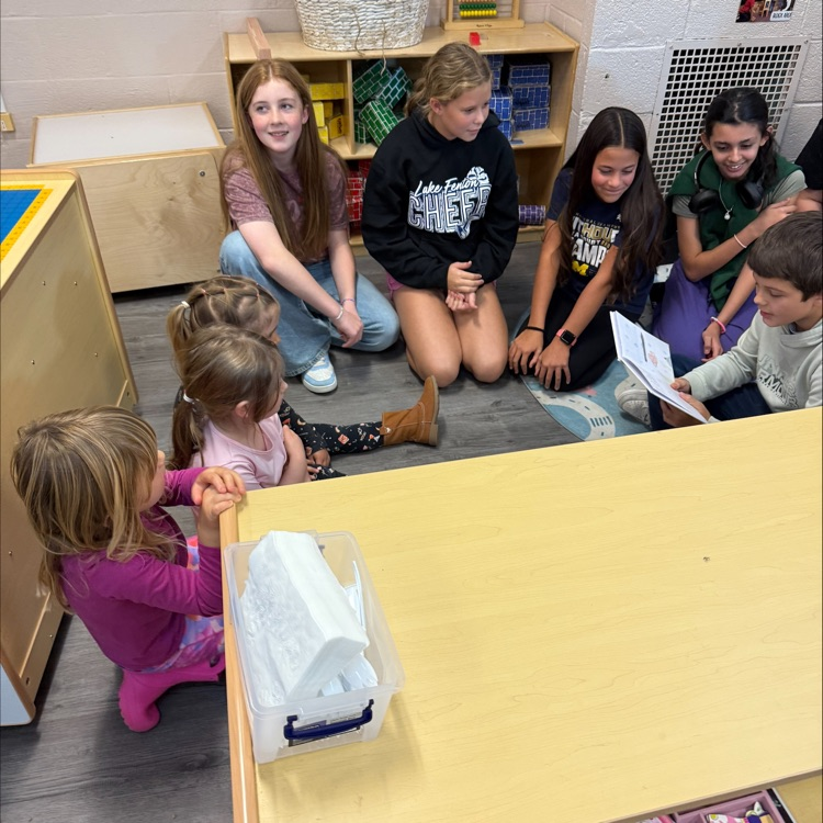 6th graders reading to preschoolers