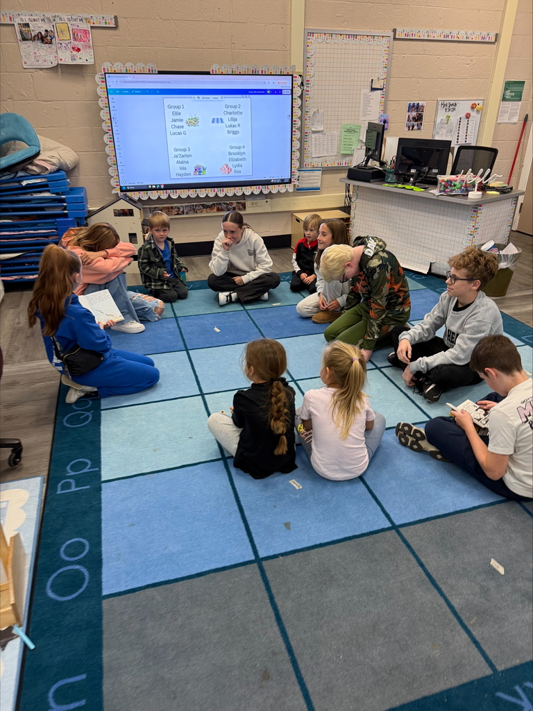 middle schoolers reading to preschoolers