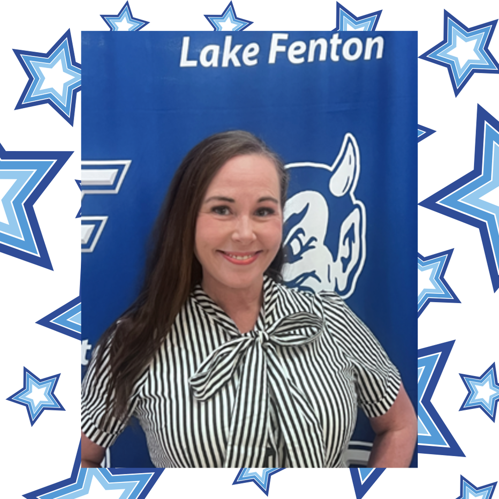 woman posing with a blue background
