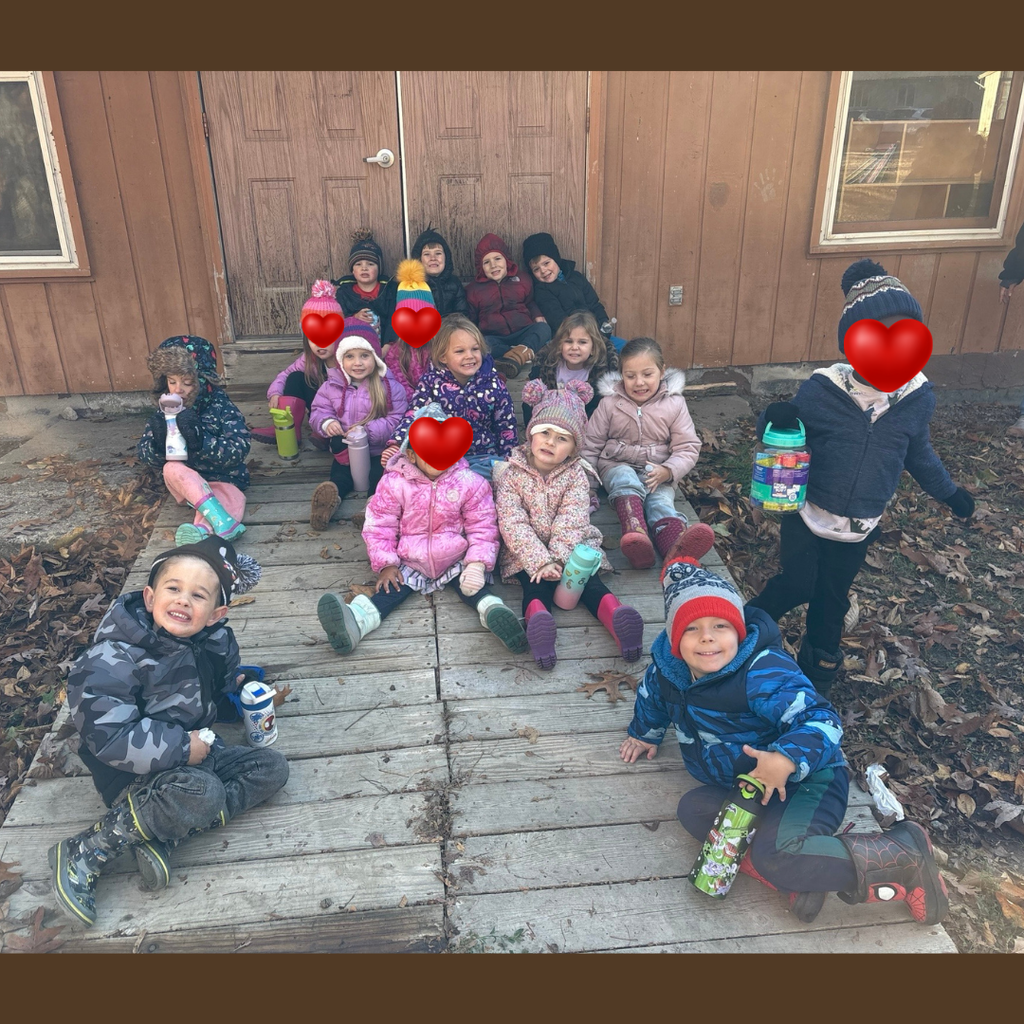 children posing outdoors