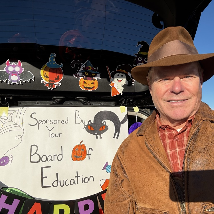man posing at trunk or treat event
