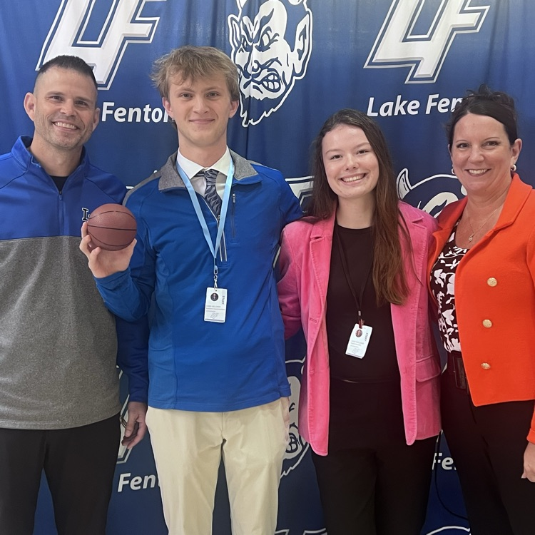 students posing with superintendents