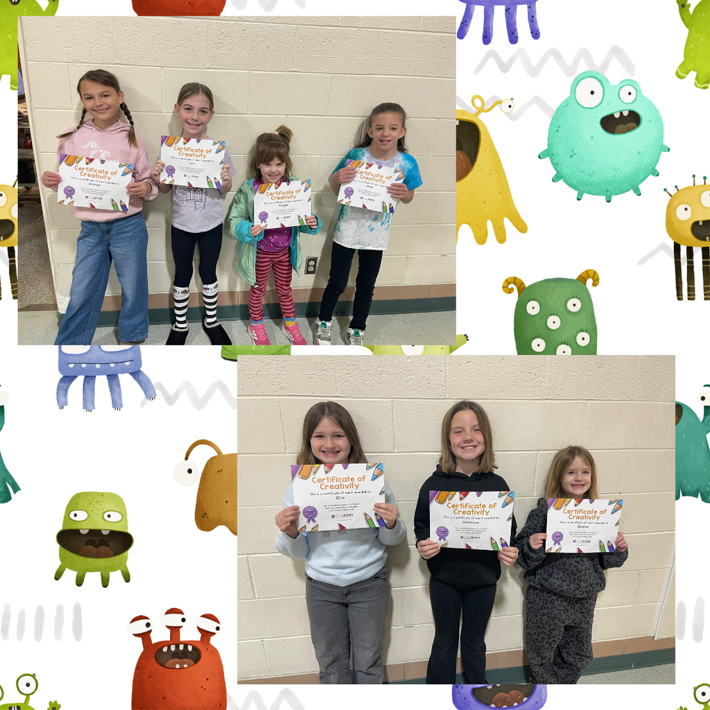 children holding drawings