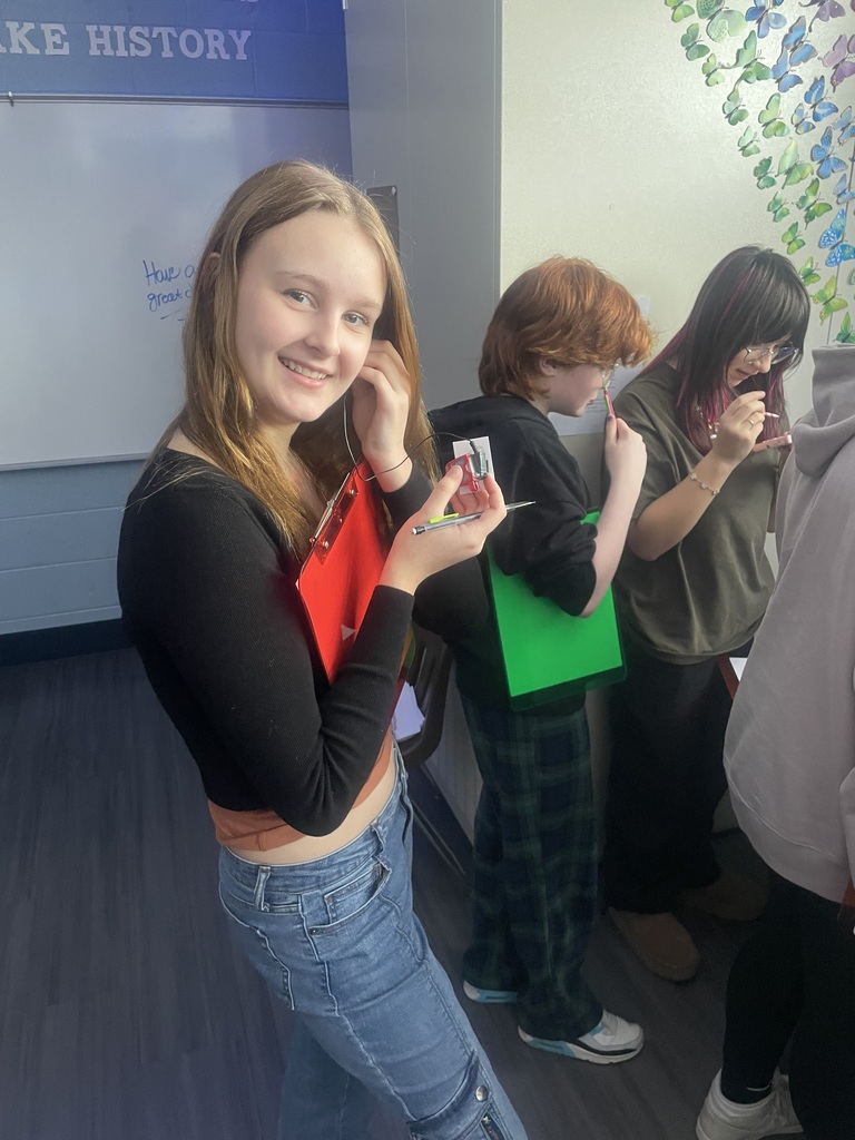 students using technology from the past