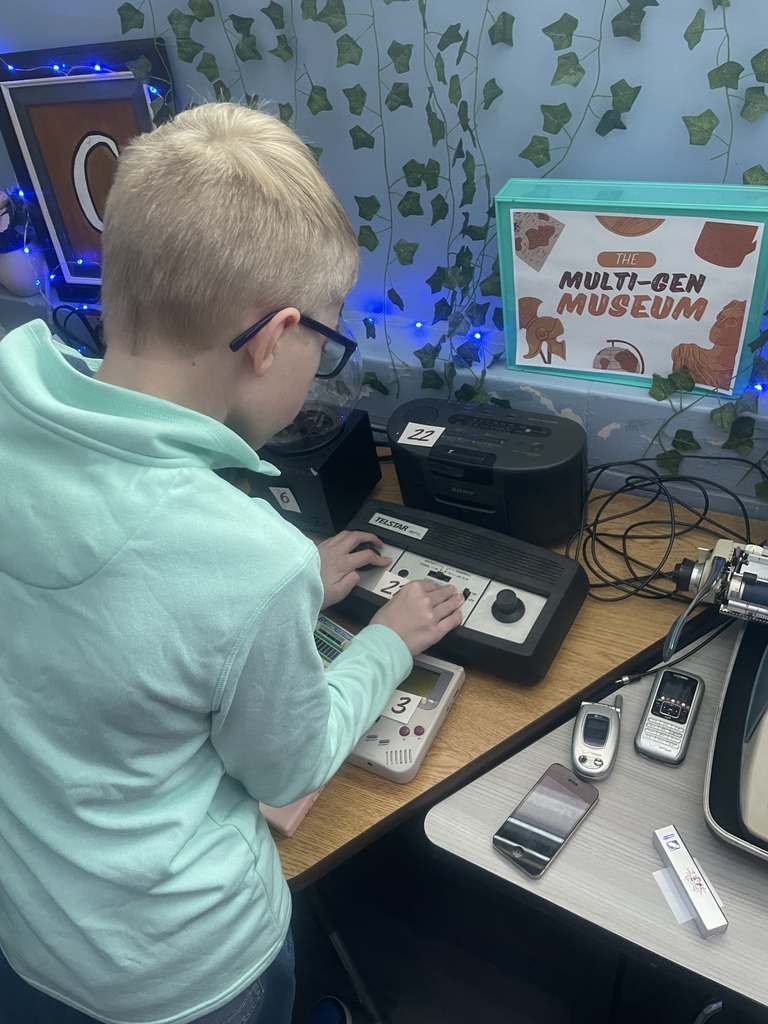 students using technology from the past