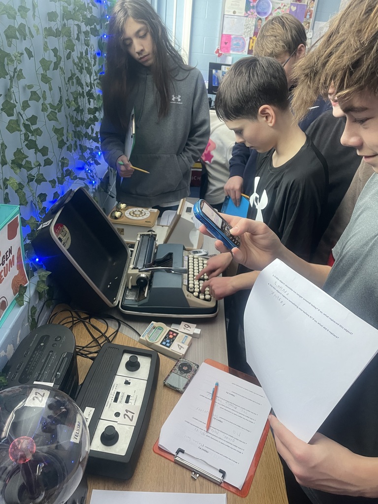 students using technology from the past