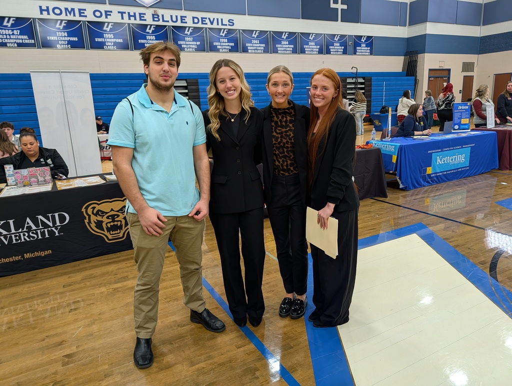 group of students posing at a job fair