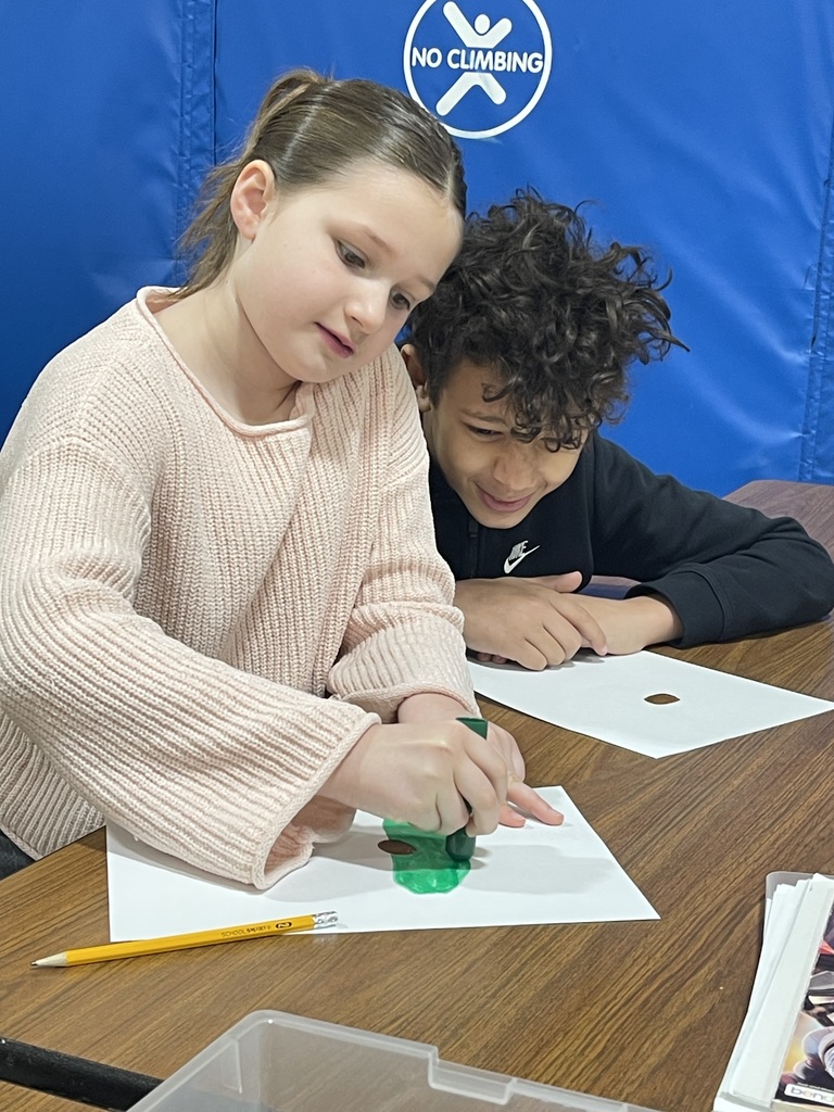 boy and girl drawing together