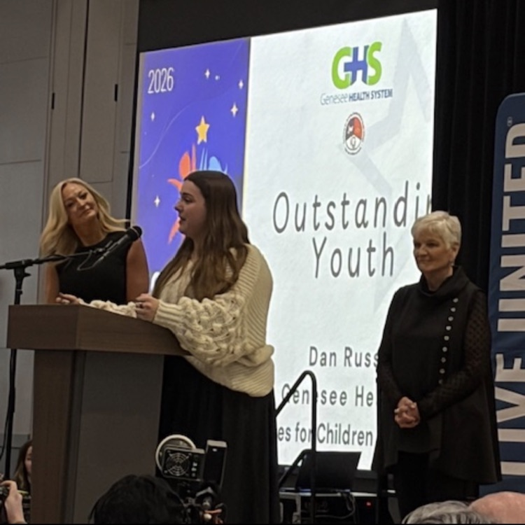 girl receiving an outstanding youth award