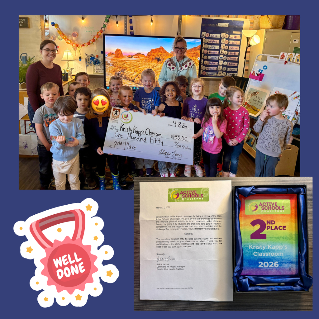 class of preschoolers holding a giant check adn a 2nd place award for active schools challenge