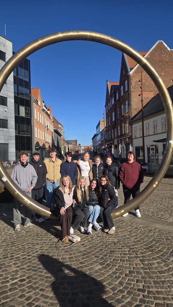 group of students posing in a ring
