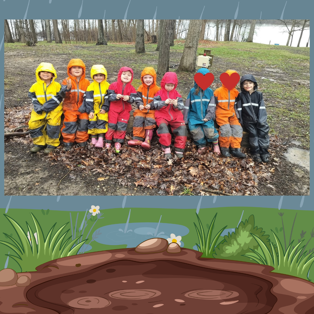 kids posing outdoors in rainsuits