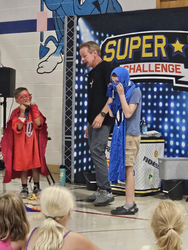 children dressed up as super heroes