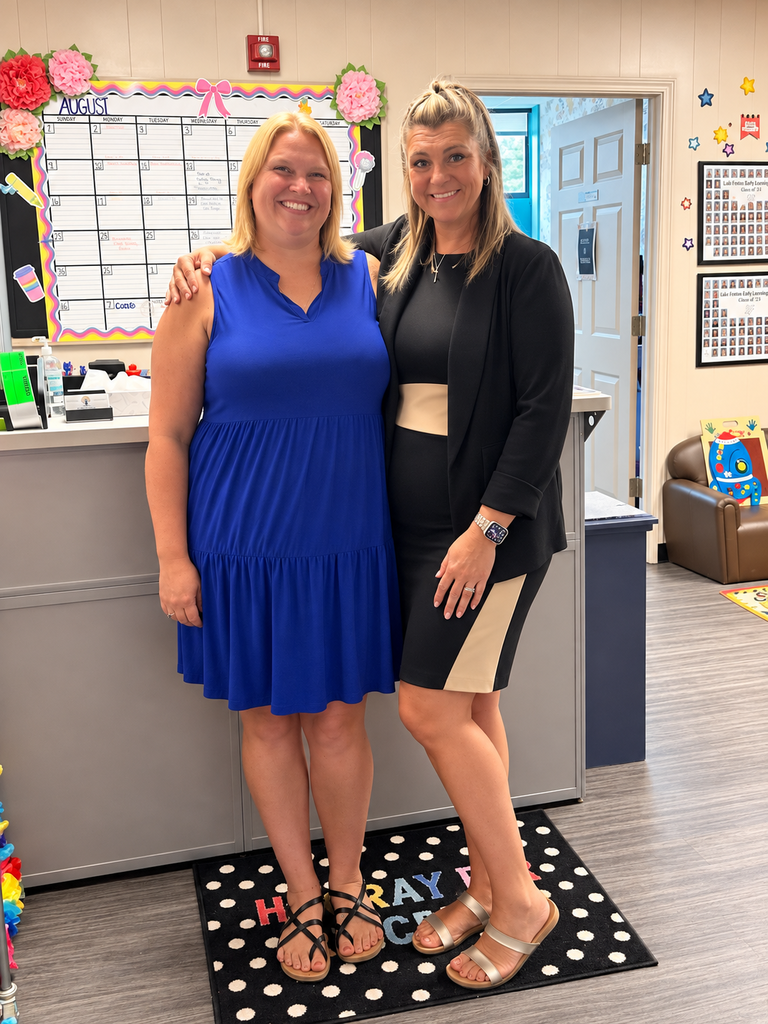 2 women posing in a preschool offfice