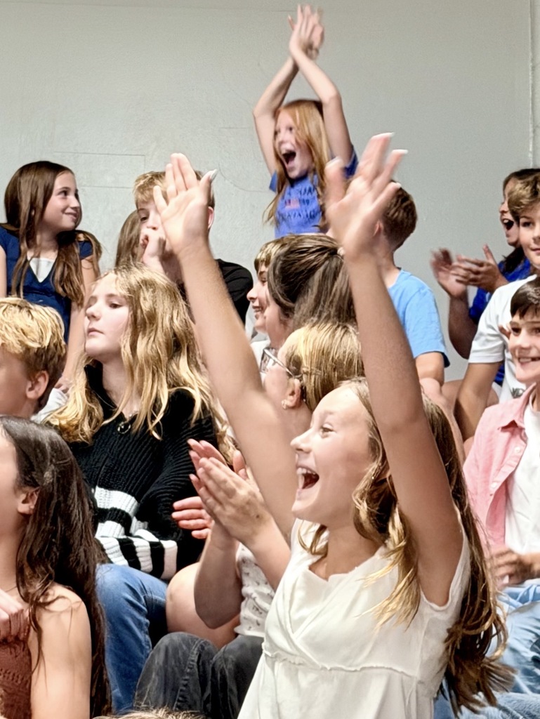 crowd of students cheering