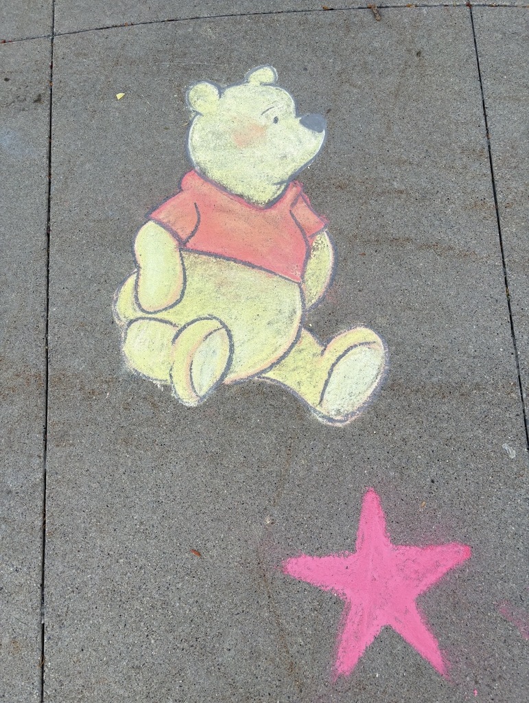 chalk drawing on sidewalk of Winnie the Pooh