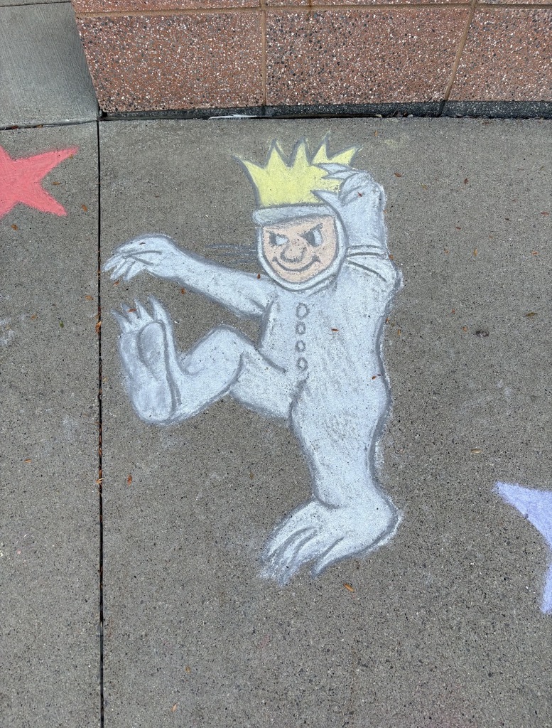chalk drawing on sidewalk of Max from Where The Wild Things Are