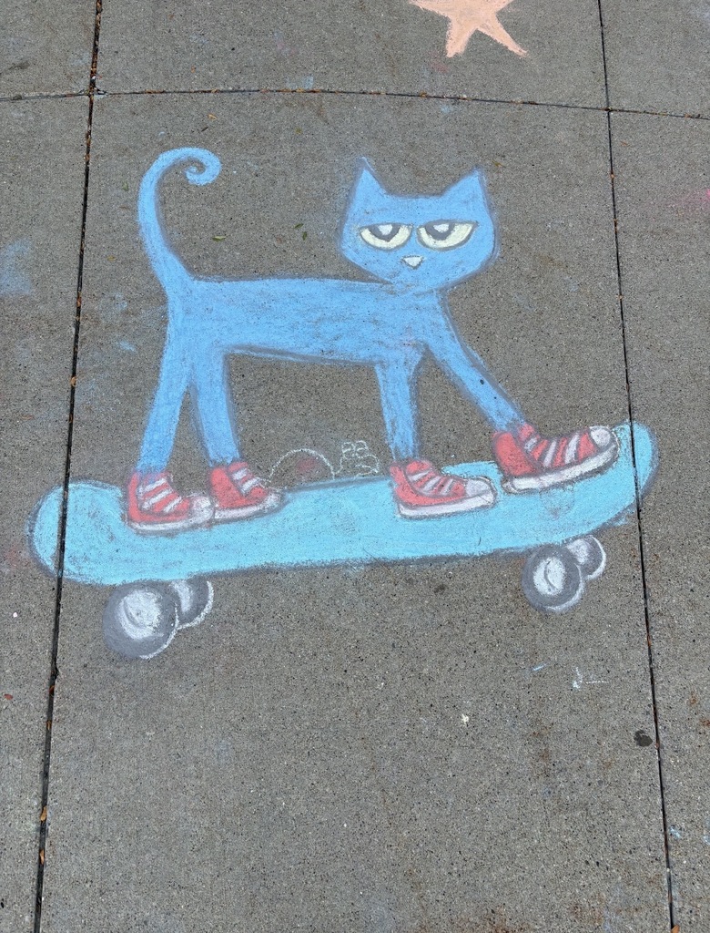 chalk drawing on sidewalk of Pete the Cat