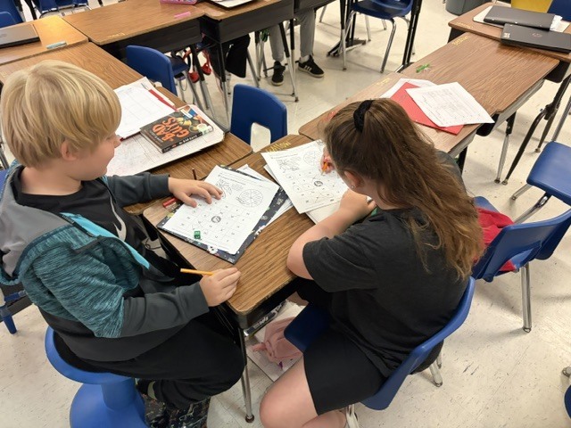 2 students working at a desk