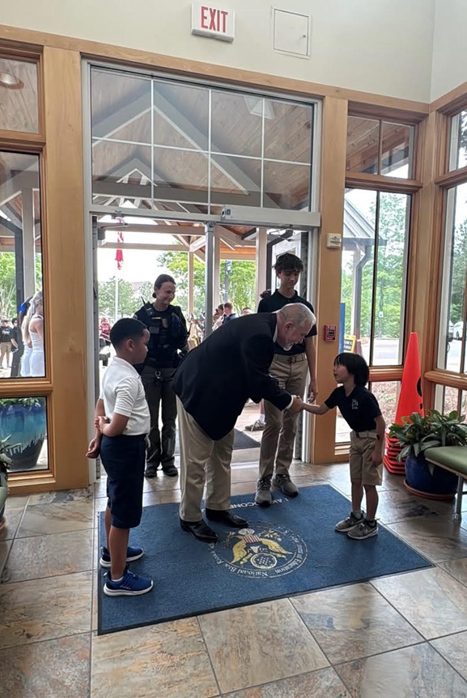 Dr. Woods entering school doors