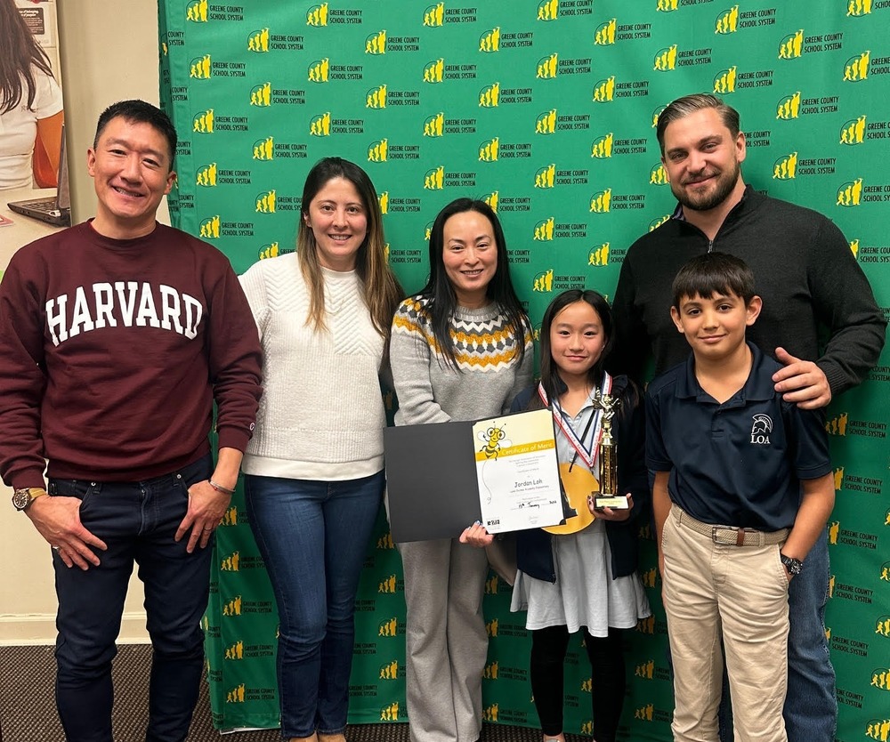 Spelling Bee Winner with Family