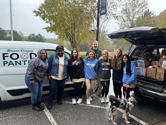 students with canned food