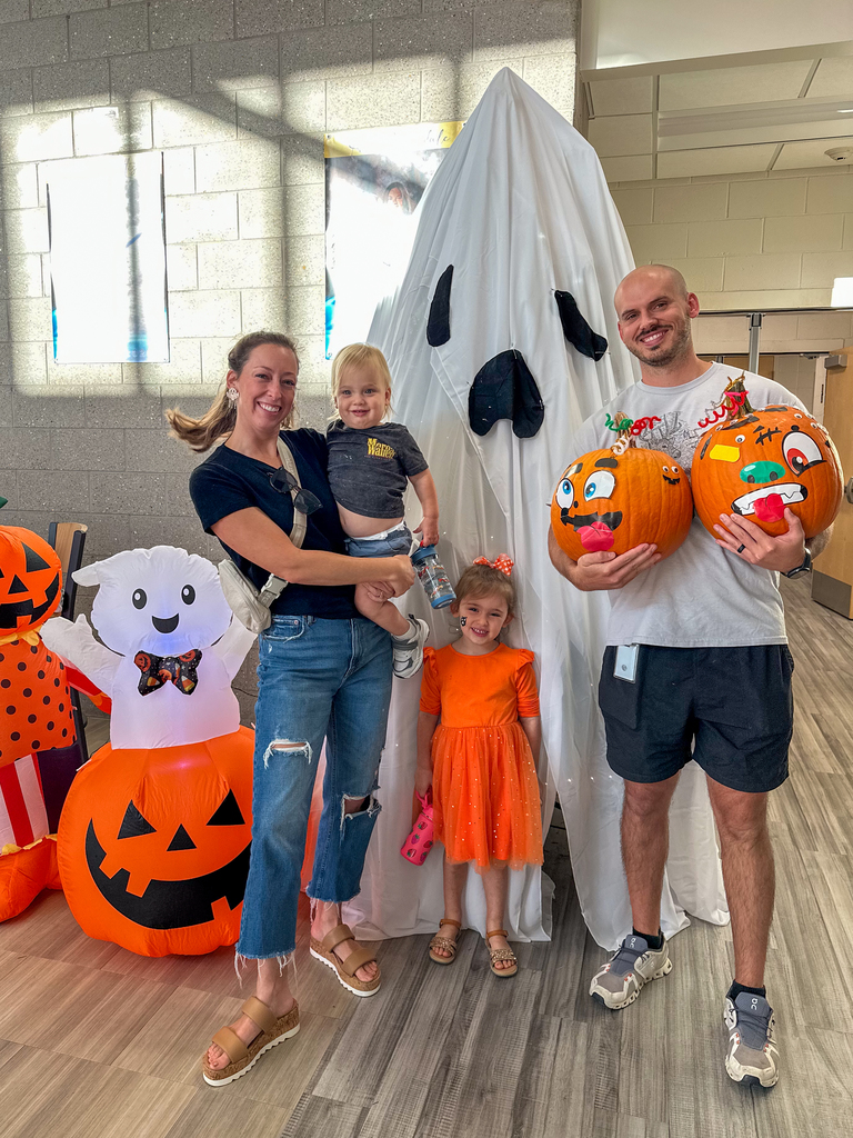family with pumpkins