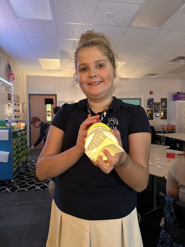 STEM student with flashlight