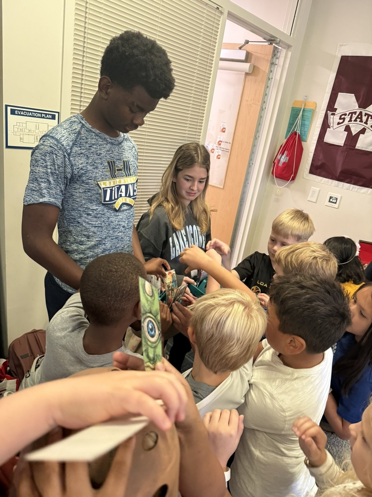 high school students with 2nd graders