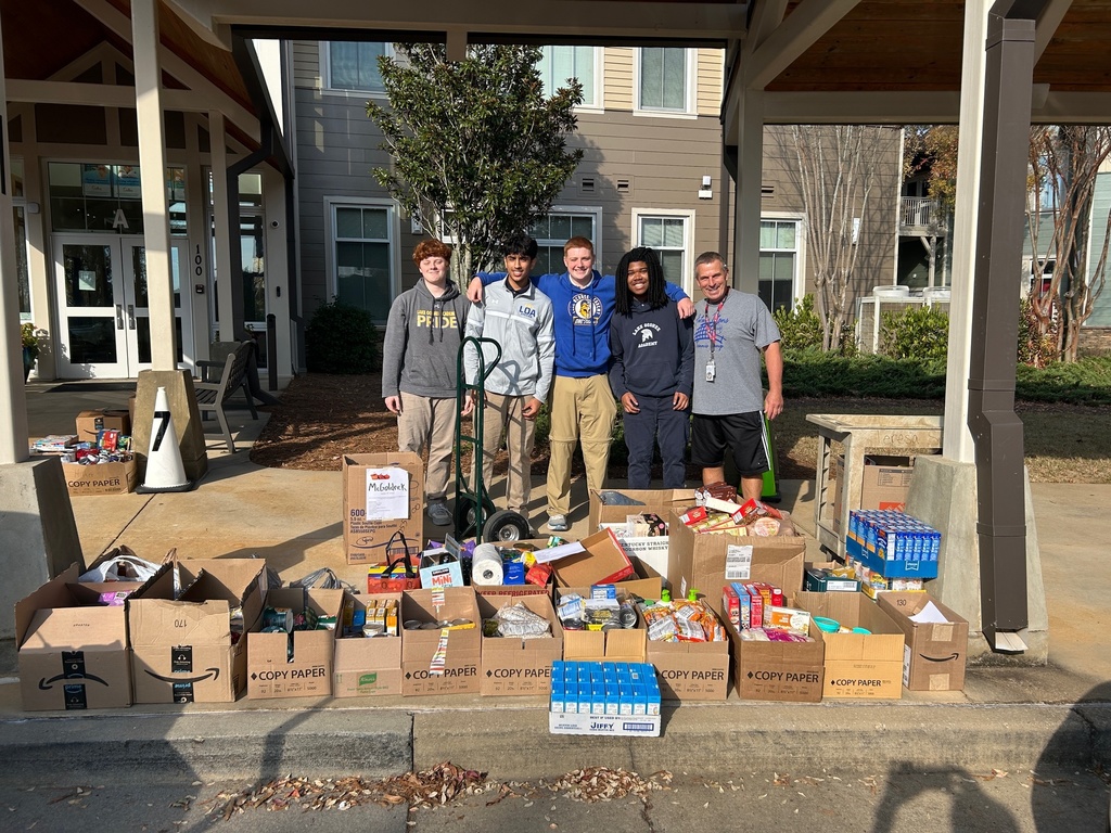 Students with boxes of food items