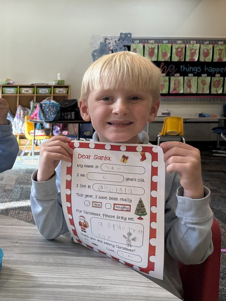 Little boy with Santa Letter