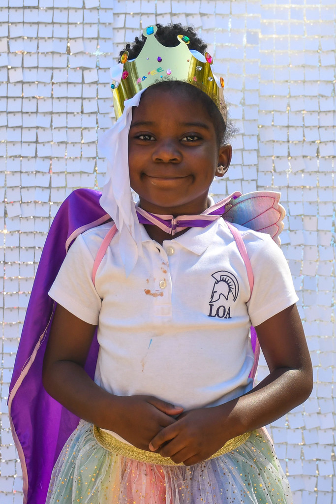 student wearing a crown