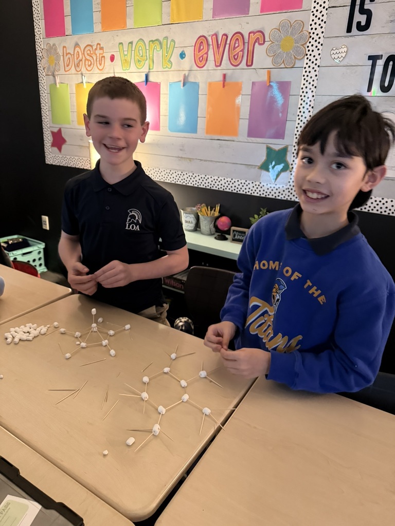 students making snowflakes