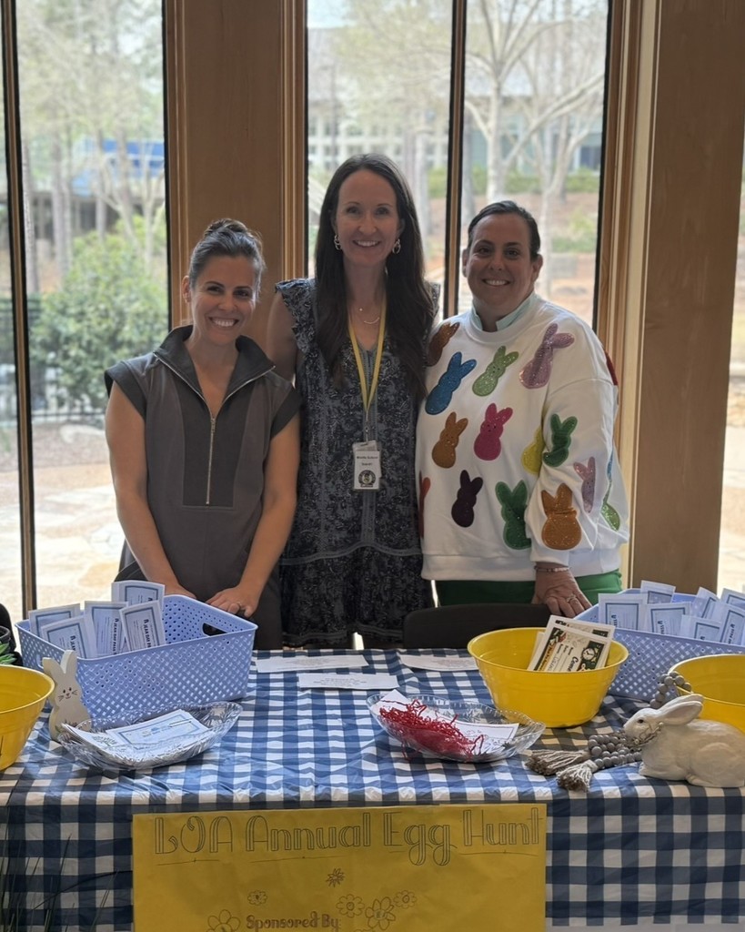 three PTC volunteers at school
