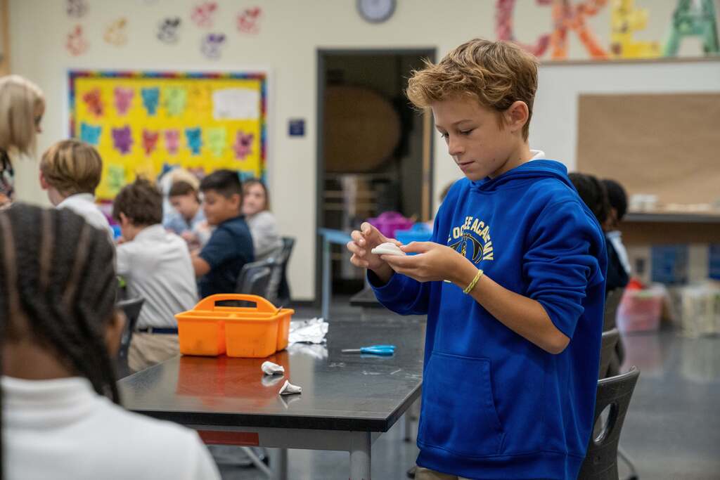 student in art class
