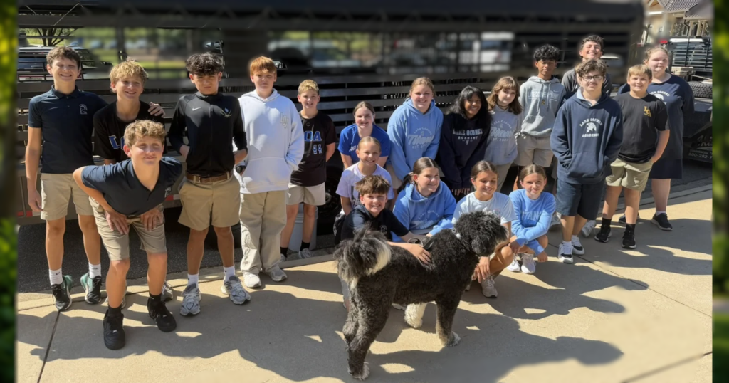 Class in front of cow Trailer