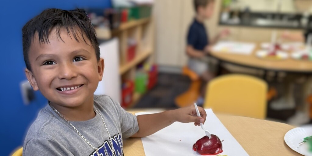 Boy eating an Apple