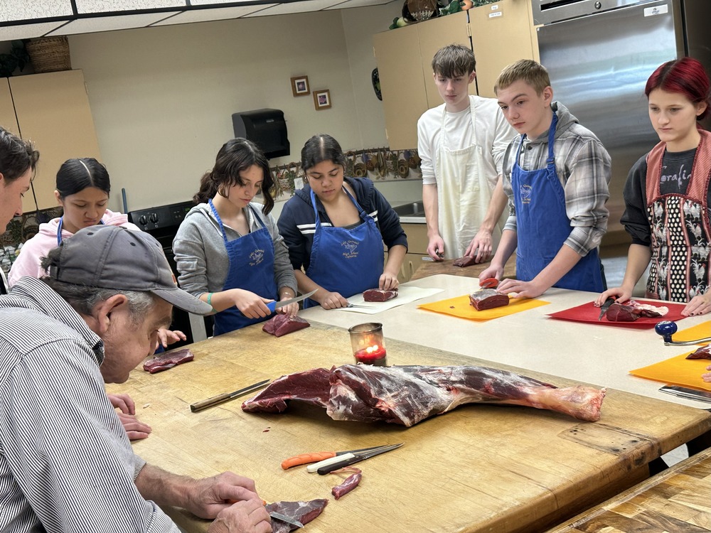 Culinary Class cutting elk steaks