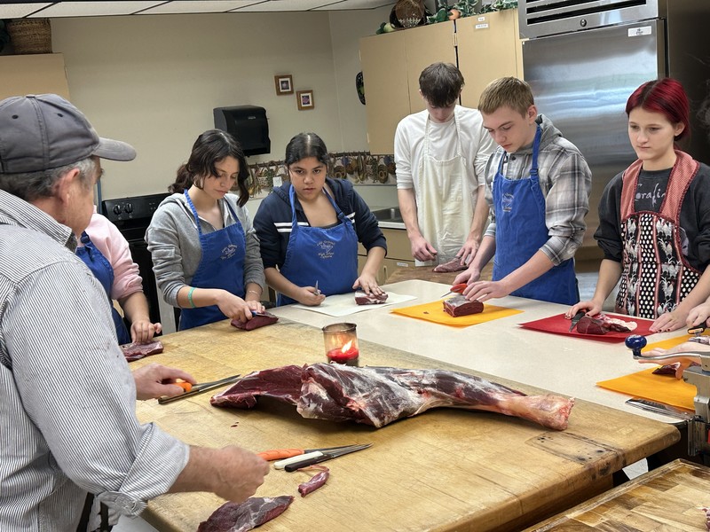 Culinary Class cutting elk steaks