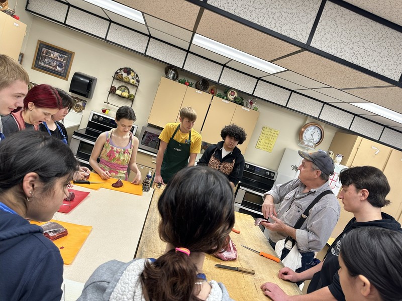 Culinary Class cutting elk steaks