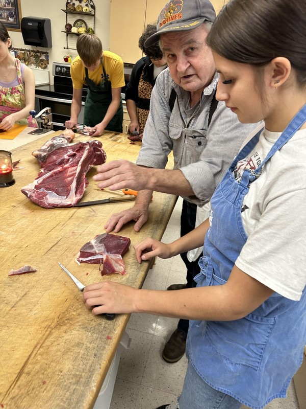 Culinary Class cutting elk steaks