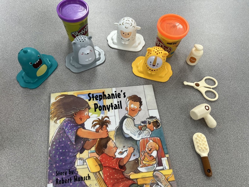 Holy cross educational social media post - book used for educational purposes