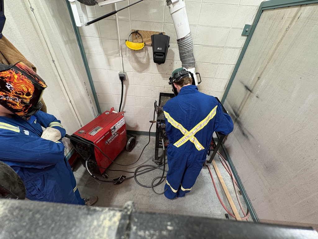 students welding