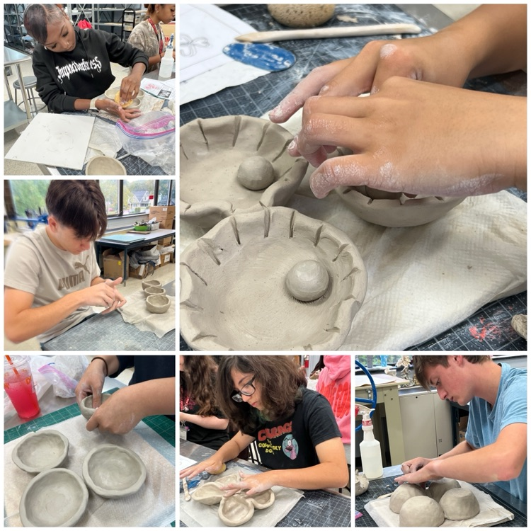 Ceramics 2 students doing a great job on their combined pinch platters.
