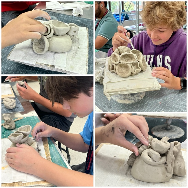 Ceramics 1 students working on their coral reef sculptures based on the work of ocean conservation activist & artist Courtney Mattison.